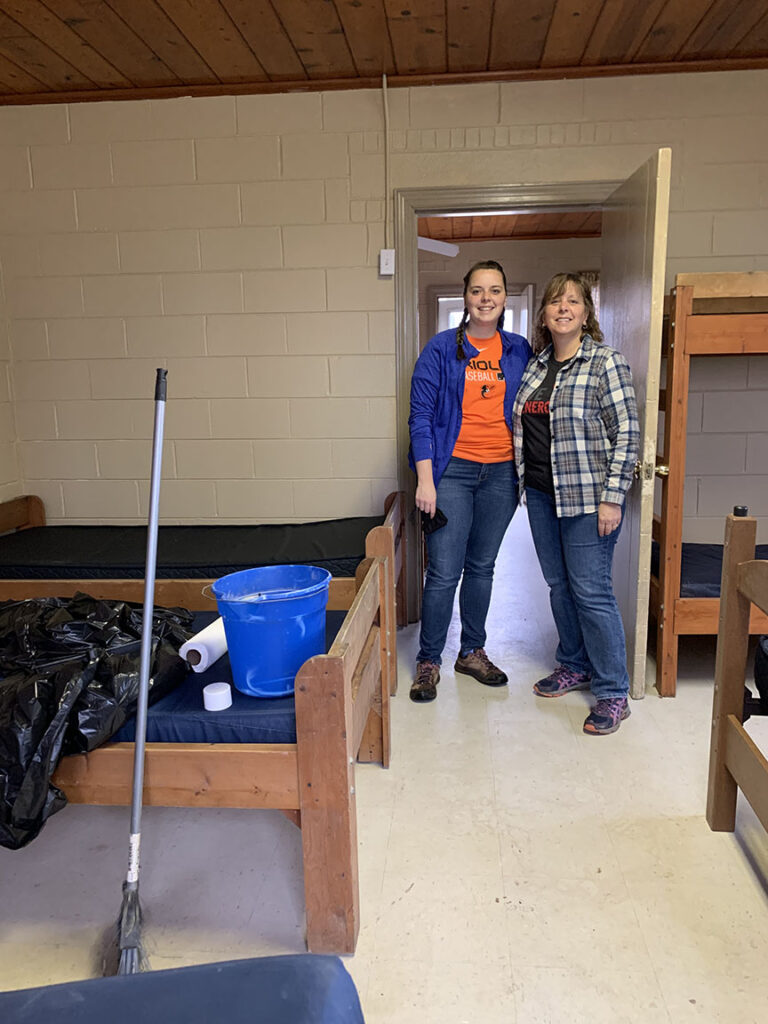 Work Day volunteers helping in cabins