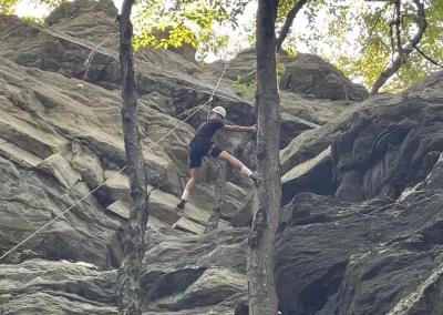 campers rock climbing