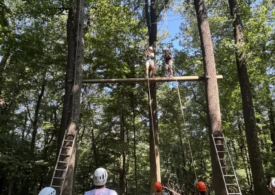 Retreat group using the high ropes course